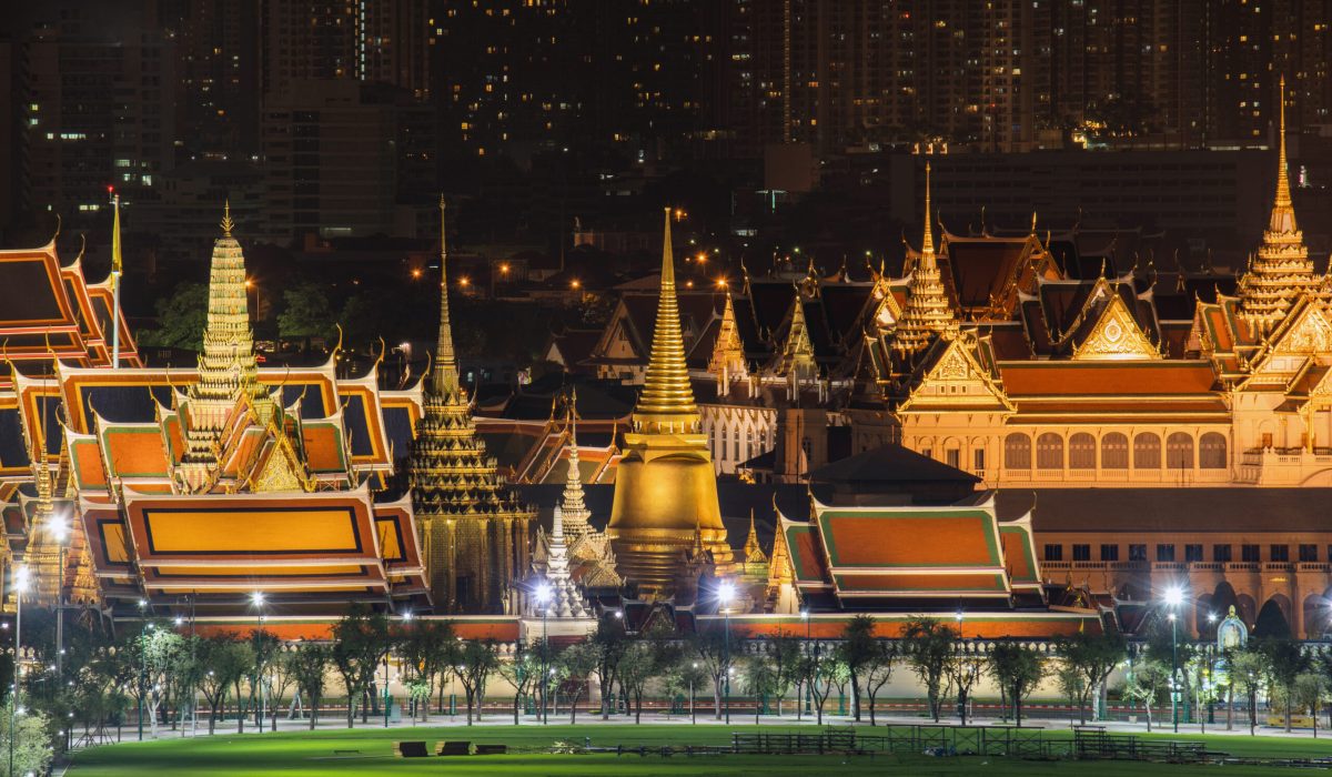 Temple of the Emerald Buddha, Grand palace, Wat Pho, Temple of Dawn, and Sanam Luang, Wat Phra Kaew, and skyscraper buildings. Bangkok City in downtown area at night, Thailand. Buddhist temple.