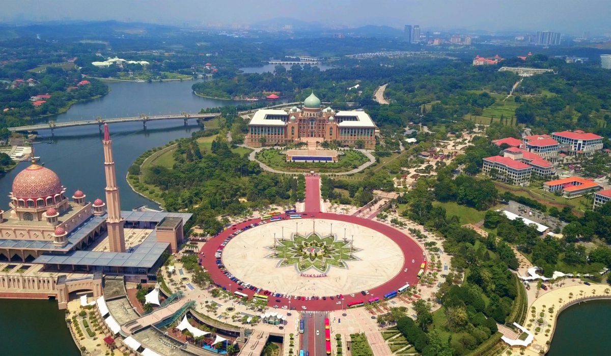 Aerial view of Putra mosque with garden landscape design and Putrajaya Lake, Putrajaya. The most famous tourist attraction in Kuala Lumpur City, Malaysia