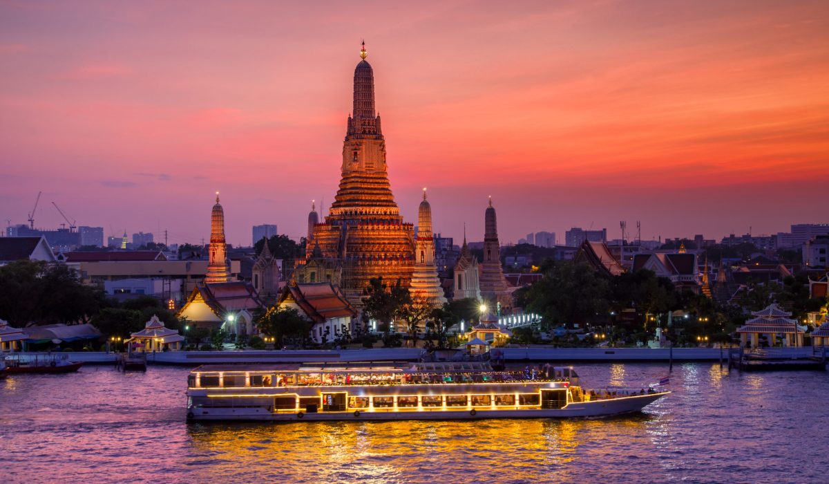 Wat Arun and cruise ship in sunset time, Bangkok city ,Thailand